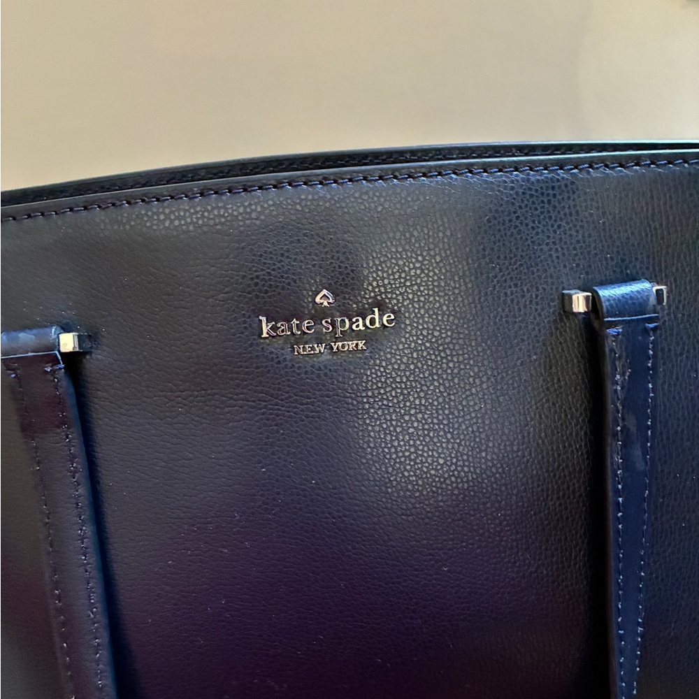 kate spade black leather tote with gold logo